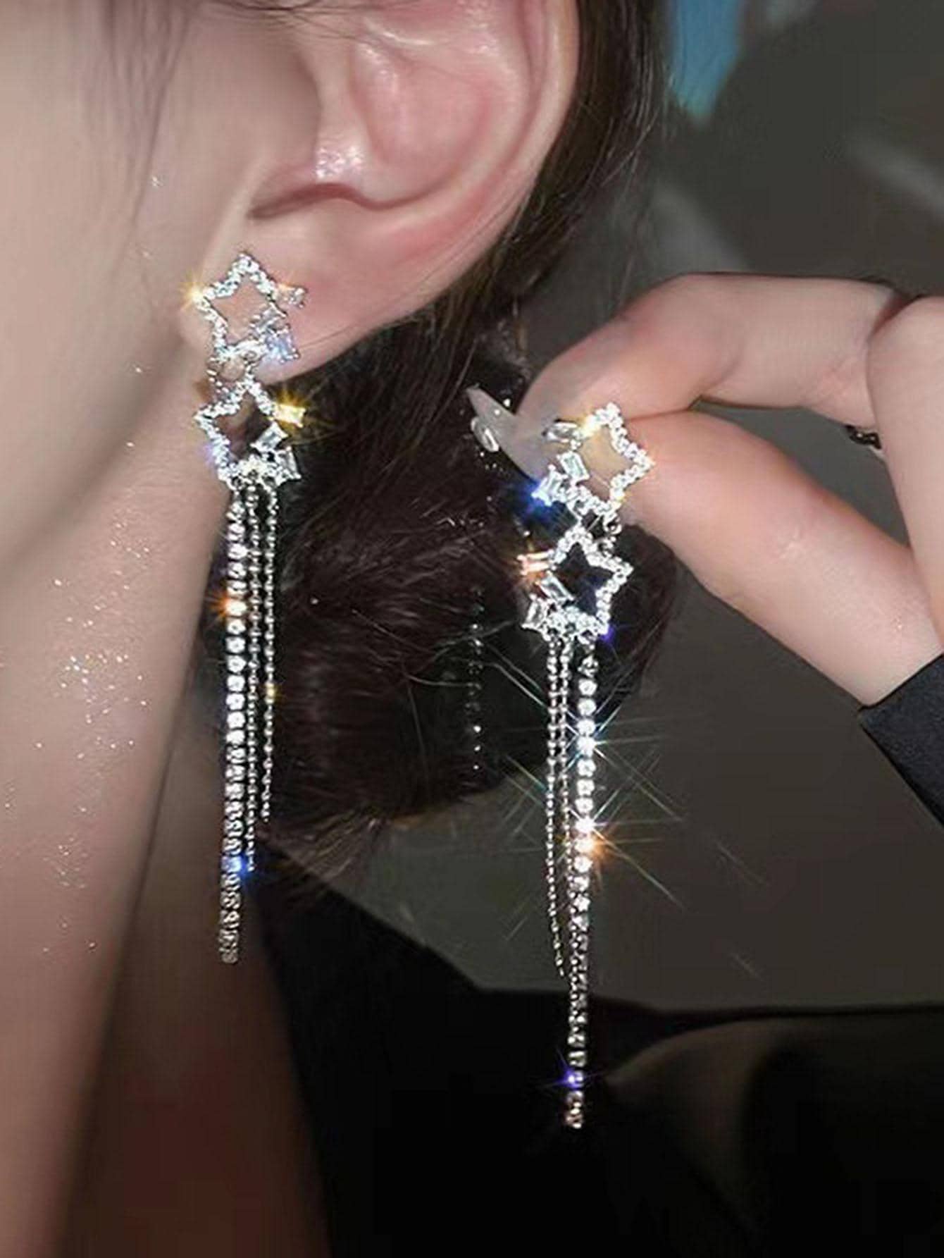 Pendientes largos con diseño de estrella con diamante de imitación