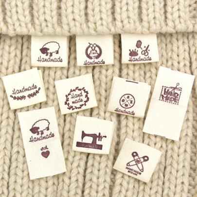 50Pcs Cloth Labels Fold Tags Sheep Heart Pattern Label For Knitted Hats Printed Woven Sew Tags 10 different styles to choose Label