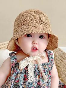 1顶男女通用婴儿及幼儿帽子，帽檐饰有针织蕾丝蝴蝶结，透气遮阳帽，适合1-6岁儿童，春、夏、秋季休闲佩戴。