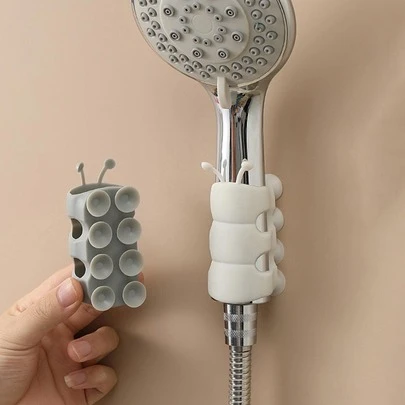 1个淋浴喷头支架，硅胶材质，吸盘式设计，不伤墙面，通用型免钻孔浴室配件浴室工具