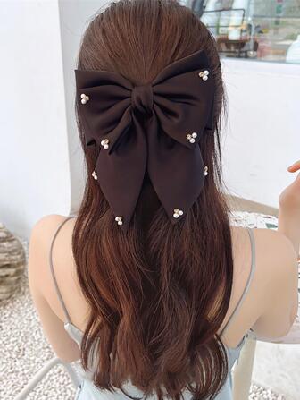 人造珍珠和蝴蝶結裝飾髮夾