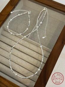 一套 S925 纯银和天然人造珍珠奢华项链和手链，采用独特华丽时尚的设计，珍贵珠宝套装婚礼珠宝新娘珠宝