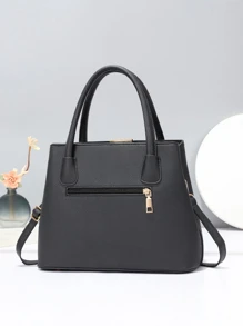 Borsa da donna nera elegante e alla moda, impermeabile