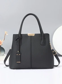 Borsa da donna nera elegante e alla moda, impermeabile