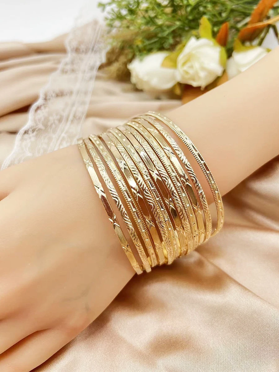 Bộ vòng tay mười hai vòng có hoa văn dập nổi bằng hợp kim sắt - Vàng - Xem 1