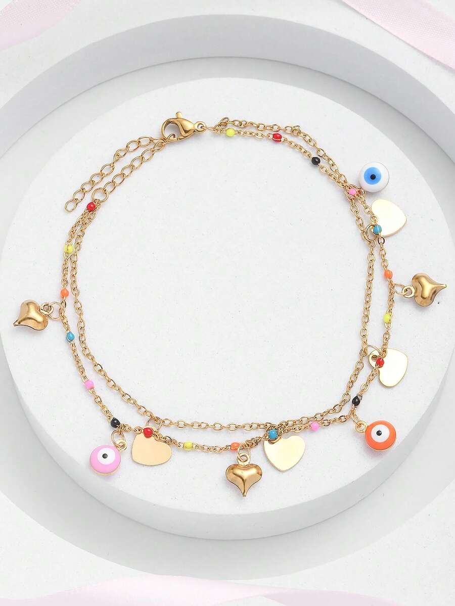 件彩色不銹鋼腳鍊，帶有惡魔之眼和心形吊飾，適合女式，非常適合海灘和派對，非常適合夏季日常穿著
