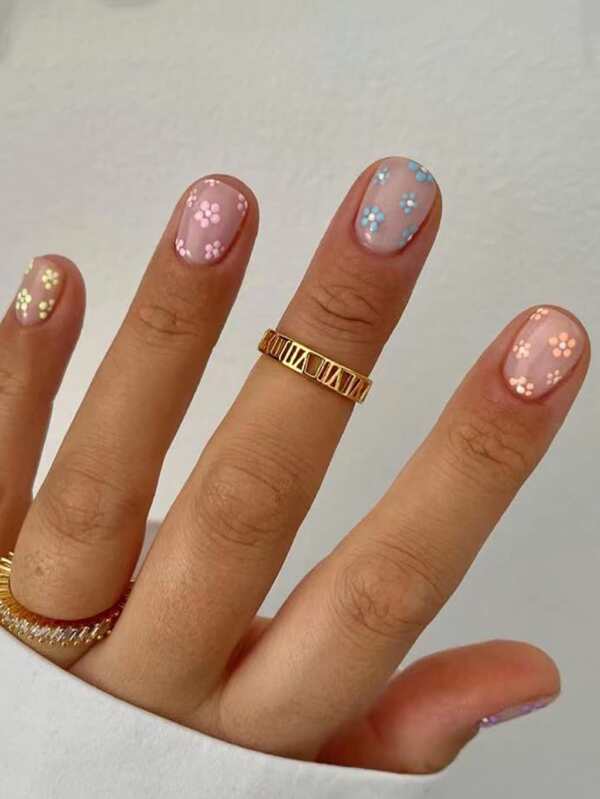 Ongles à pression à marguerite pastel, 24pcs courtes carrés ongles faux de design fleurs à la mode avec 1 pièce de lime à ongles et 1 pièce de colle gelée pour fournitures d'ongles
