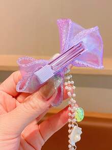 1入組女孩人造珍珠和網紗蝴蝶結裝飾鐳射貝殼吊墜髮夾鏈夾