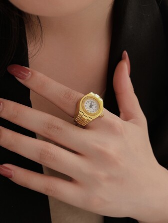Anillo de color dorado con diseño de reloj de cuarzo a la moda para mujeres y hombres