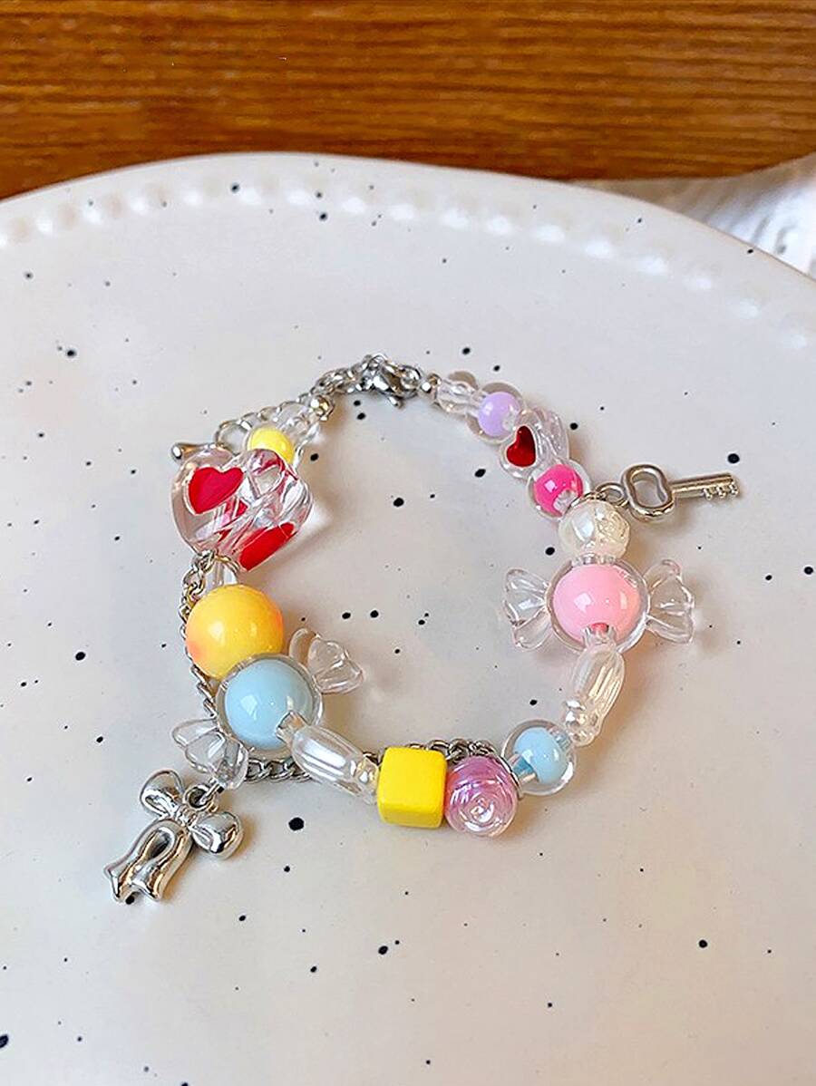 Kẹo Màu sắc Dopamine vui tươi Cô gái Ngọt ngào dễ thương vui tươi Mát mẻ Tua Bowknot vui tươi Mát mẻ Nóng Cô gái Love Ly Màu sắc Hạt Thiết kế Chuỗi vòng tay - Đầy màu sắc - Xem 1