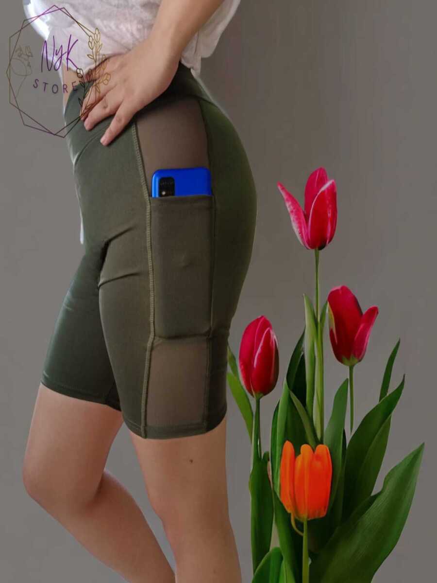 Licra deportiva para mujer, licra con transparencia al costado, licra con bolsillo para celular, leggins cortos moda deportivos , short pilates yoga tipo biker - Verde militar - Ver 1