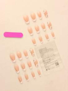 这套24片白色棺材形短假指甲，饰有法式花朵图案和水钻，可立即提升您的时尚感。套装包含果冻胶和指甲锉。按压式指甲 美甲用品 美甲 - 彩色 - 查看 2