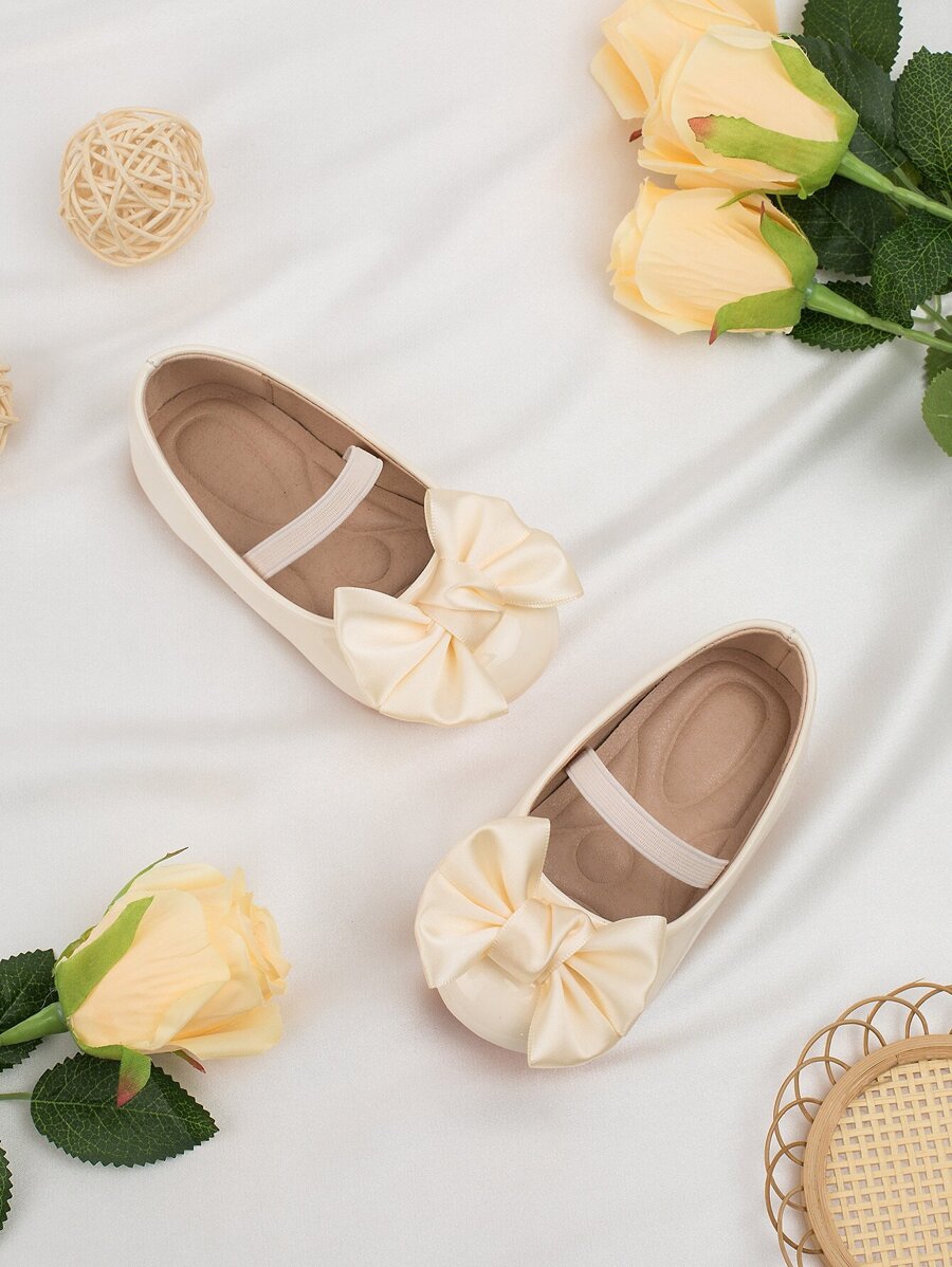 1 双可爱蝴蝶结纯素皮革 + 按摩底柔软防滑平底婴儿学步鞋，适合春、夏、秋、冬