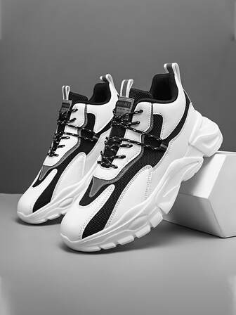 男士運動鞋,鞋面網眼設計透氣透氣,鞋帶式扎帶設計,舒適的鞋底