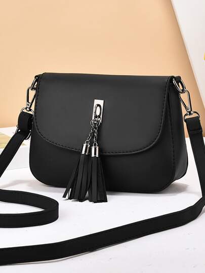 Bolso de hombro cruzado de mujer de unicolor con correa ajustable de PU y decoración de borla