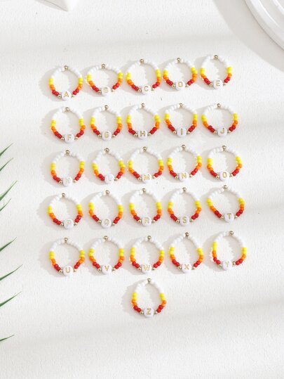 1pc Elastic Beaded Ring With White Faux Pearls And Adjustable Alphabet Detail For Women