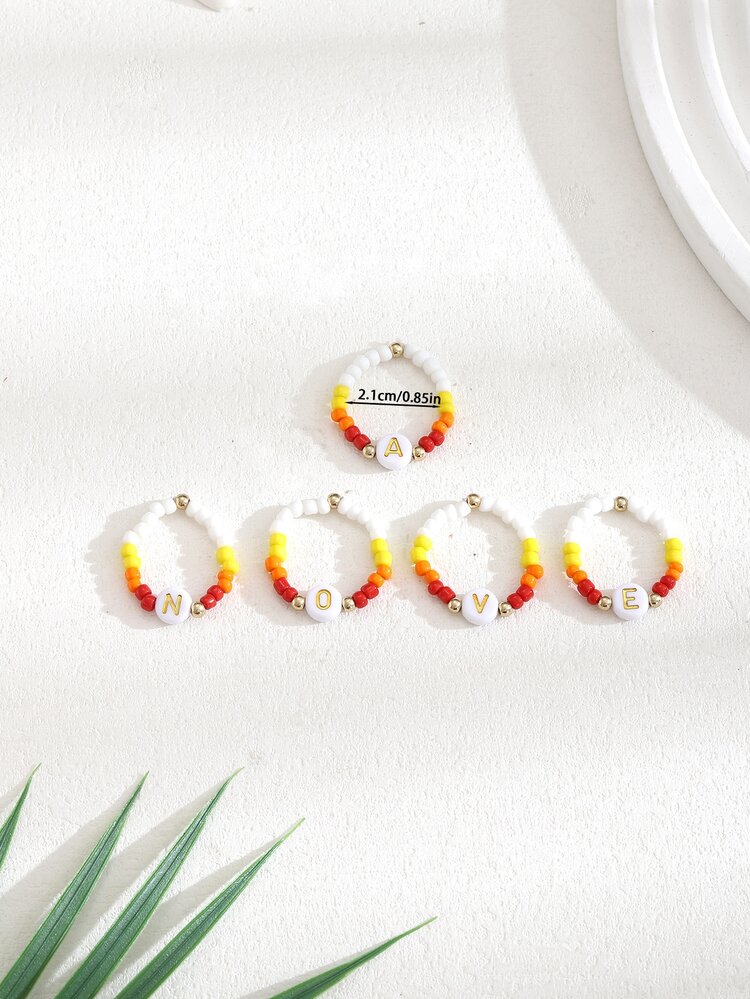 1pc Elastic Beaded Ring With White Faux Pearls And Adjustable Alphabet Detail For Women