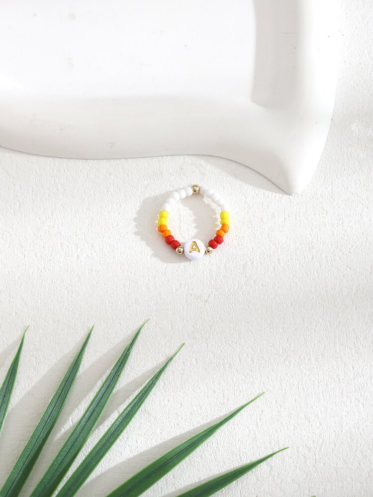 1pc Elastic Beaded Ring With White Faux Pearls And Adjustable Alphabet Detail For Women