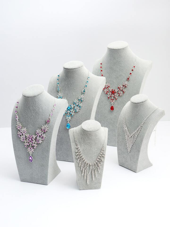 Grey velvet jewelry display store