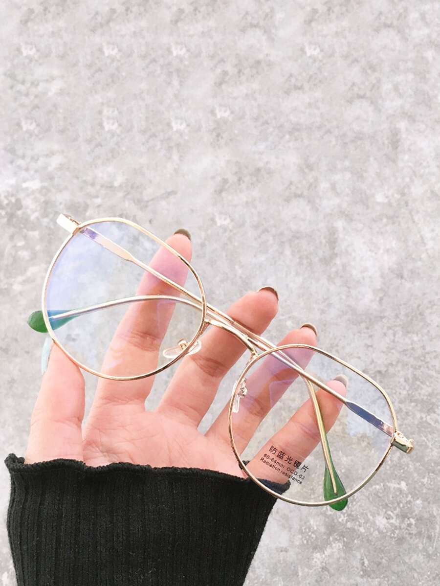 Montures de gafas vintage coreanas para mujeres, nuevos lanzamientos 2024 Gafas asimétricas de metal sin graduación