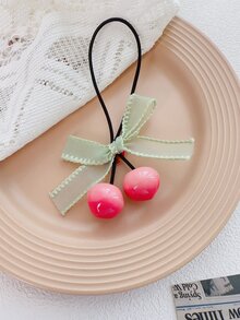 1入組女童珊瑚粉色櫻桃造型綁髮圈,配有蝴蝶結,不傷髮