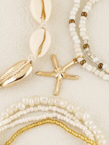 7 Stücke/Set handgefertigtes Damenarmband im böhmischen Strandstil mit Reisperlen, Seesternen und Muscheln