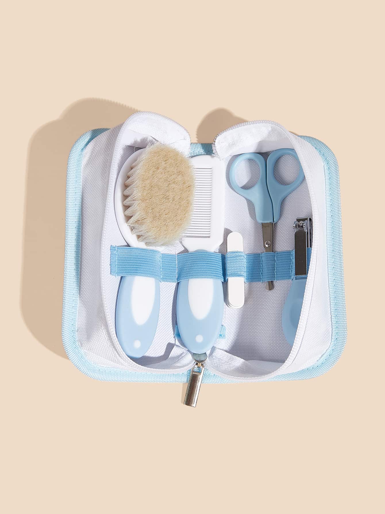 Bộ chăm sóc em bé 5 món trong túi màu xanh, bao gồm lược, bàn chải, dụng cụ cắt móng tay và các dụng cụ chăm sóc em bé khác - Màu xanh lam - Xem 1
