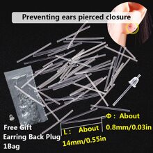 1 boîte de belles boucles d'oreilles hypoallergéniques transparentes sur des tiges en plastique d'environ 14 mm. Barre d'oreille invisible claire, convient pour le port quotidien des femmes