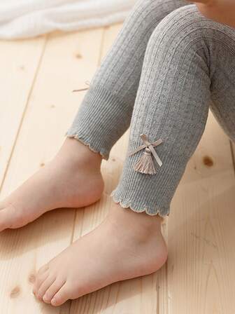 2-8歲孩子們的秋天長褲帶可愛流蘇,蝴蝶結,和長款設計,合適的適合女孩至穿戴作為緊身打底褲