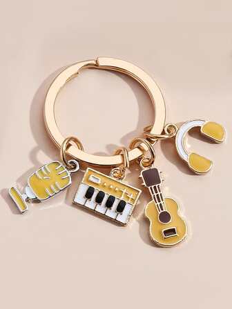 1 pieza Llavero con dibujos animados nota musical creativo como regalo