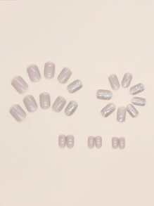 24入組短方形卡通圖案假指甲，配1把指甲檔和1片果凍膠按壓指甲，指甲用品