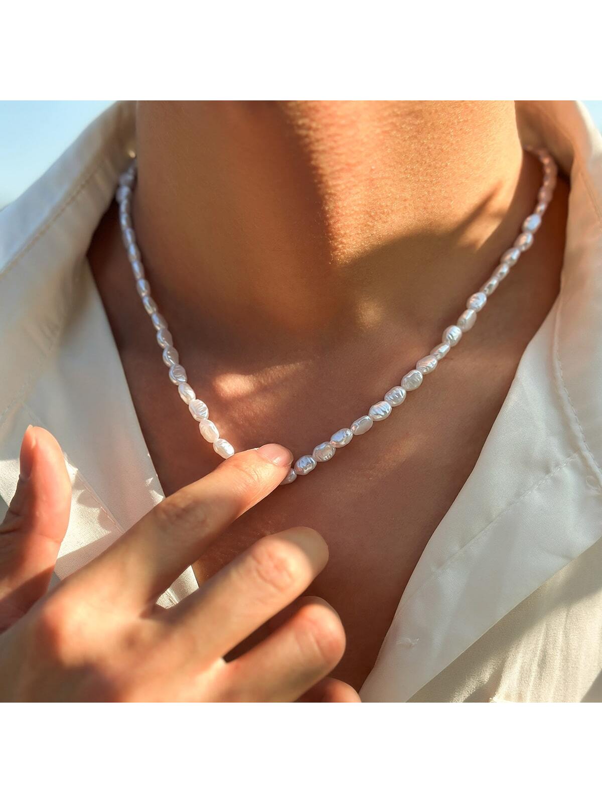Faux pearl necklace