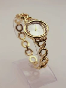 1 Peça Pulseira de Relógio Feminino Fashionable Dourada de Liga com Mostrador de Quartzo para Decoração Diária como Presente para Estudantes Retornando à Escola