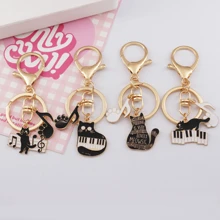 4pcs/set Artistic Piano & Music Note & Cat Shaped Keychain, Bag & Key Decoration Pendant For Music Lover