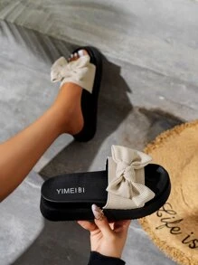 女款蝴蝶結裝飾底平底拖鞋，米色