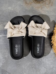 女款蝴蝶結裝飾底平底拖鞋，米色