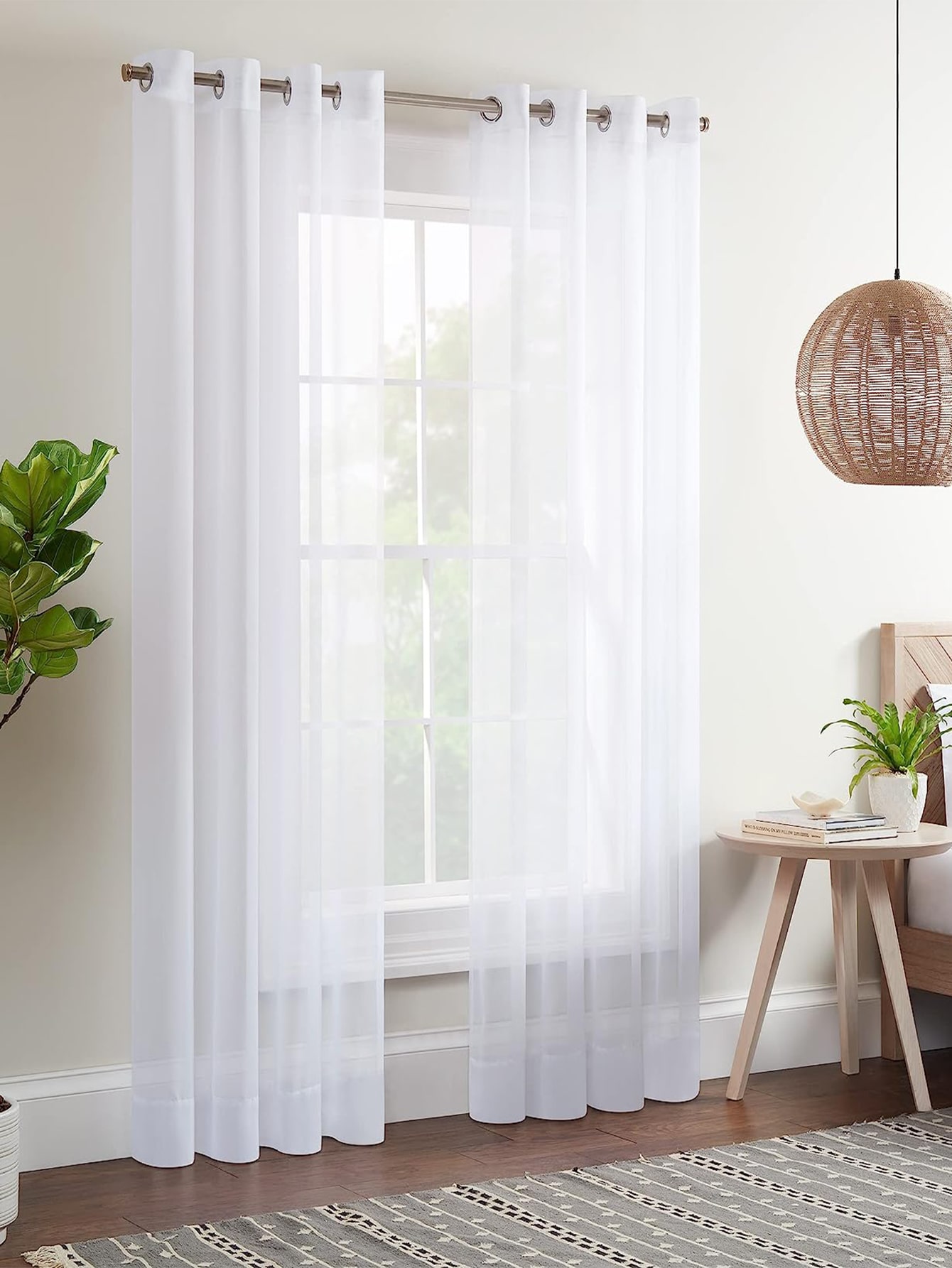 Sheer curtain panel