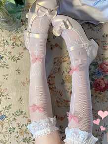 1 par de mujeres Calcetines dulce estilo dulce caramelo chupete & con diseño de lazo rodilla Calcetines de tubo para mujeres