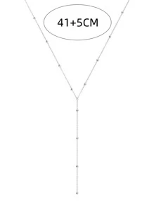 1條簡約流蘇和珠飾y字長項鏈,適合女性日常穿著