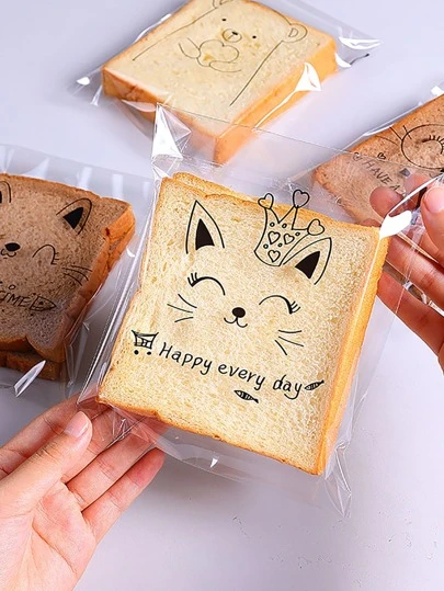 50قطعة أكياس خبز/توست شفافة ذاتية اللصق بنمط كرتوني عشوائي لوازم مدرسية مناسبة للحلوى والشوكولاته والبسكويت إلخ.
