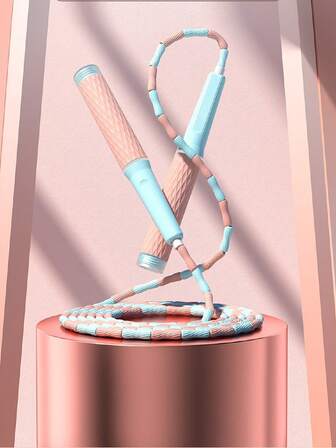 1個帶有竹子設計手柄的兒童健身加重跳繩