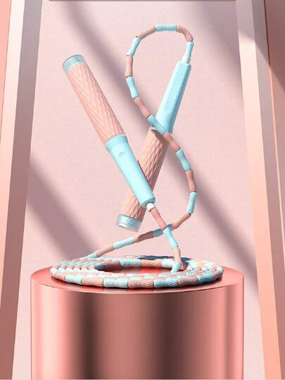 1個帶有竹子設計手柄的兒童健身加重跳繩