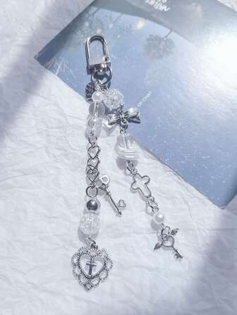 1入可愛時尚的鑰匙扣/包包吊飾/手機吊飾,帶有珠子、蝴蝶結、心形十字架