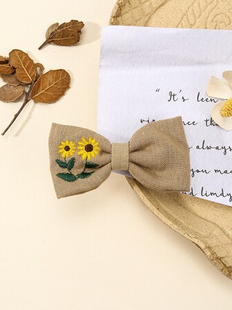 1入款軍綠色向日葵蝴蝶結髮夾,高雅時尚的蝴蝶結裝飾髮飾,適用於日常使用