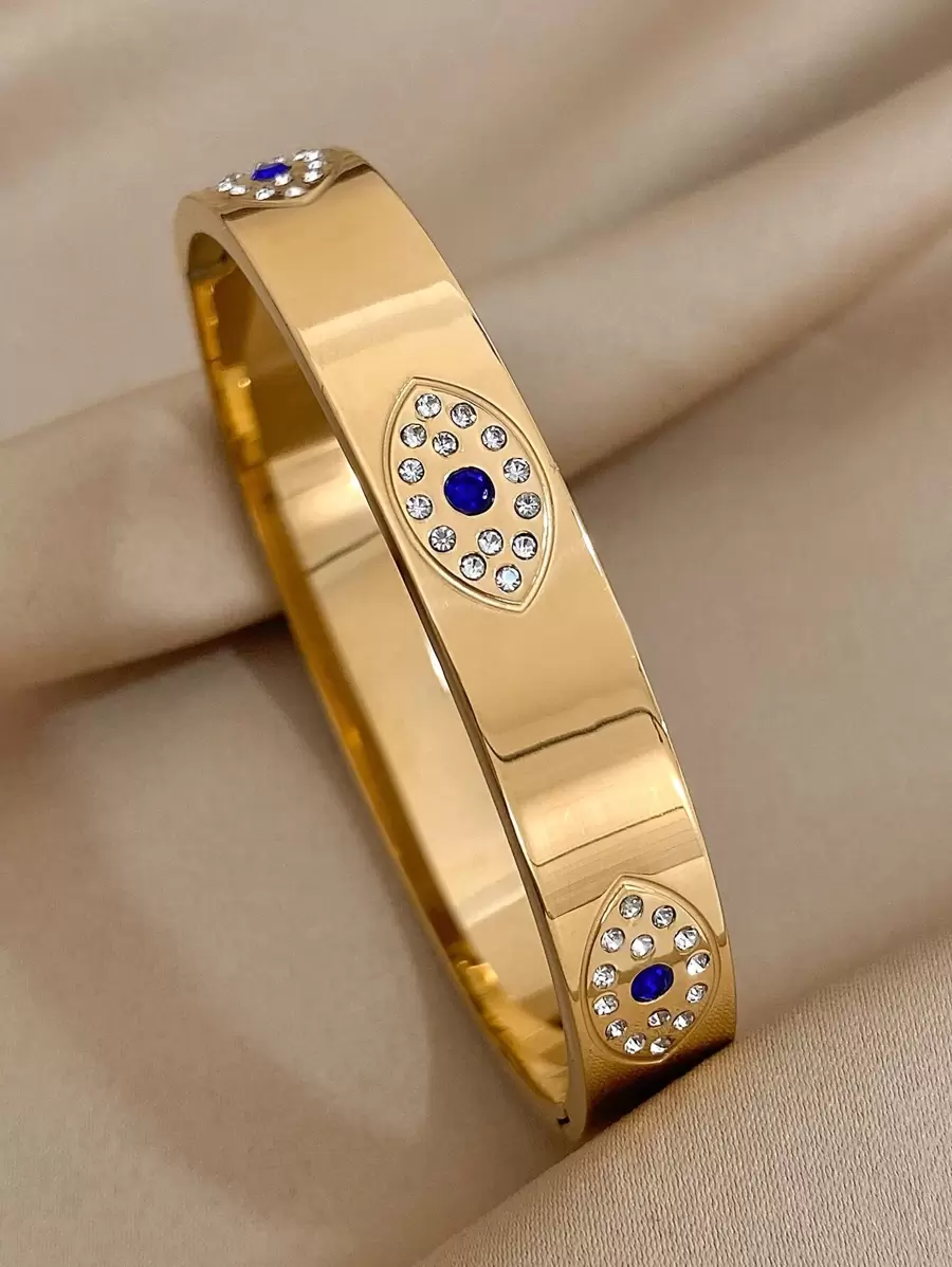 1 pieza Pulsera de acero inoxidable con diseño de ojos malvados de color dorado para mujeres y hombres, pulsera ancha con lujo de cristales, pulsera para pareja