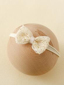 1對嬰兒防滑蝴蝶結襪子和1頂嬰兒髮箍