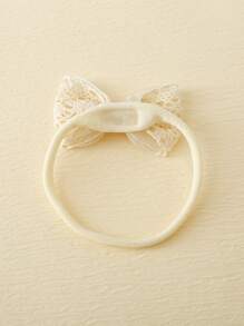 1對嬰兒防滑蝴蝶結襪子和1頂嬰兒髮箍