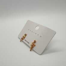 Aretes serpiente con piedrecitas brillante