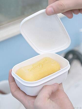 1個白色肥皂盒帶蓋子