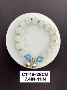 1入組迷人的設計鈴鐺墜飾手環適合女士,彈性帶可調尺寸,穿戴,燈藍白色